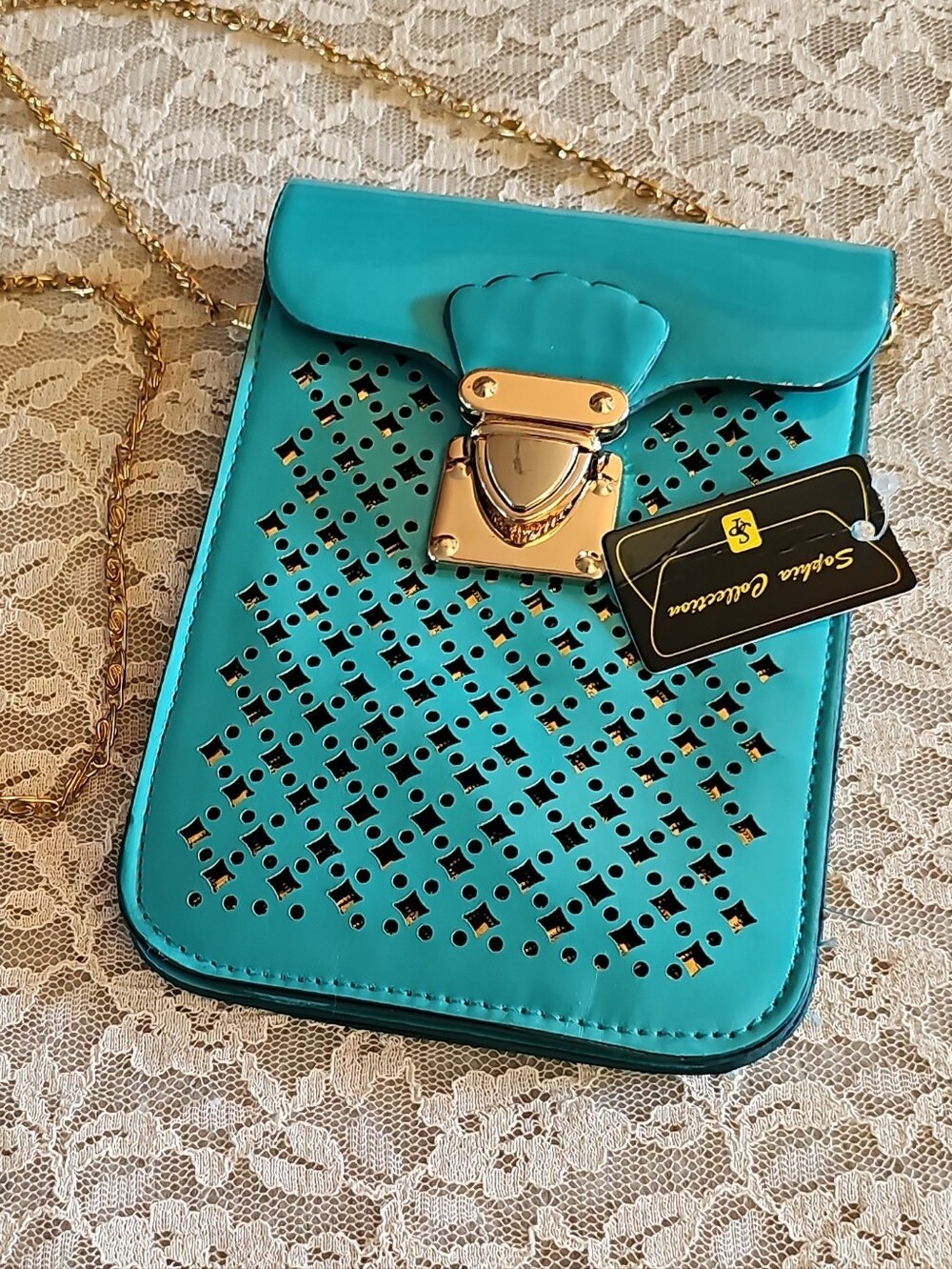Turquoise Perforated Crossbody Bag with Gold Hardware